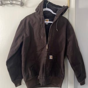 Woman’s carhartt jacket brown.It has wax melted on the one sleeve. See pictures